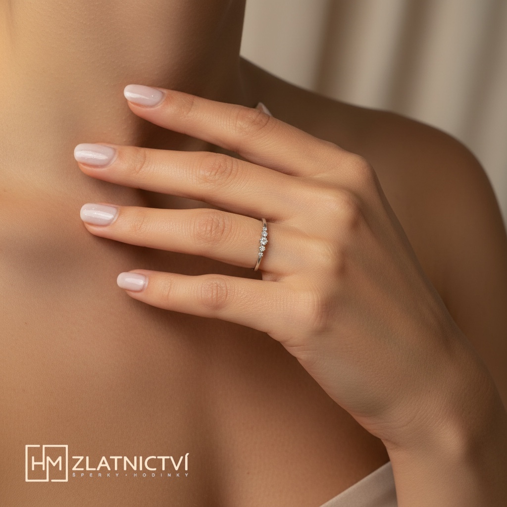 Romantický prsten z bílého zlata s řadou zirkonů 2-3460